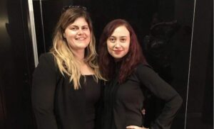 Jaimie Keelah, UCLA psychology professor and friendship researcher, poses for a photo with a colleague.