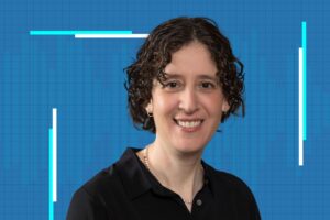 Elissa Hallem, a scientist, against a blue background with vertical light streaks for the Science Interrupted series.