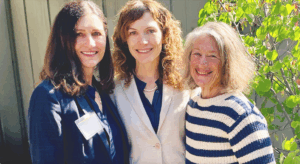 Amy Rowat with Co-Chairs of the Gold Shield Faculty Prize Committee. On the left: Michellene DeBonis, on the right: Karren Ganstwig